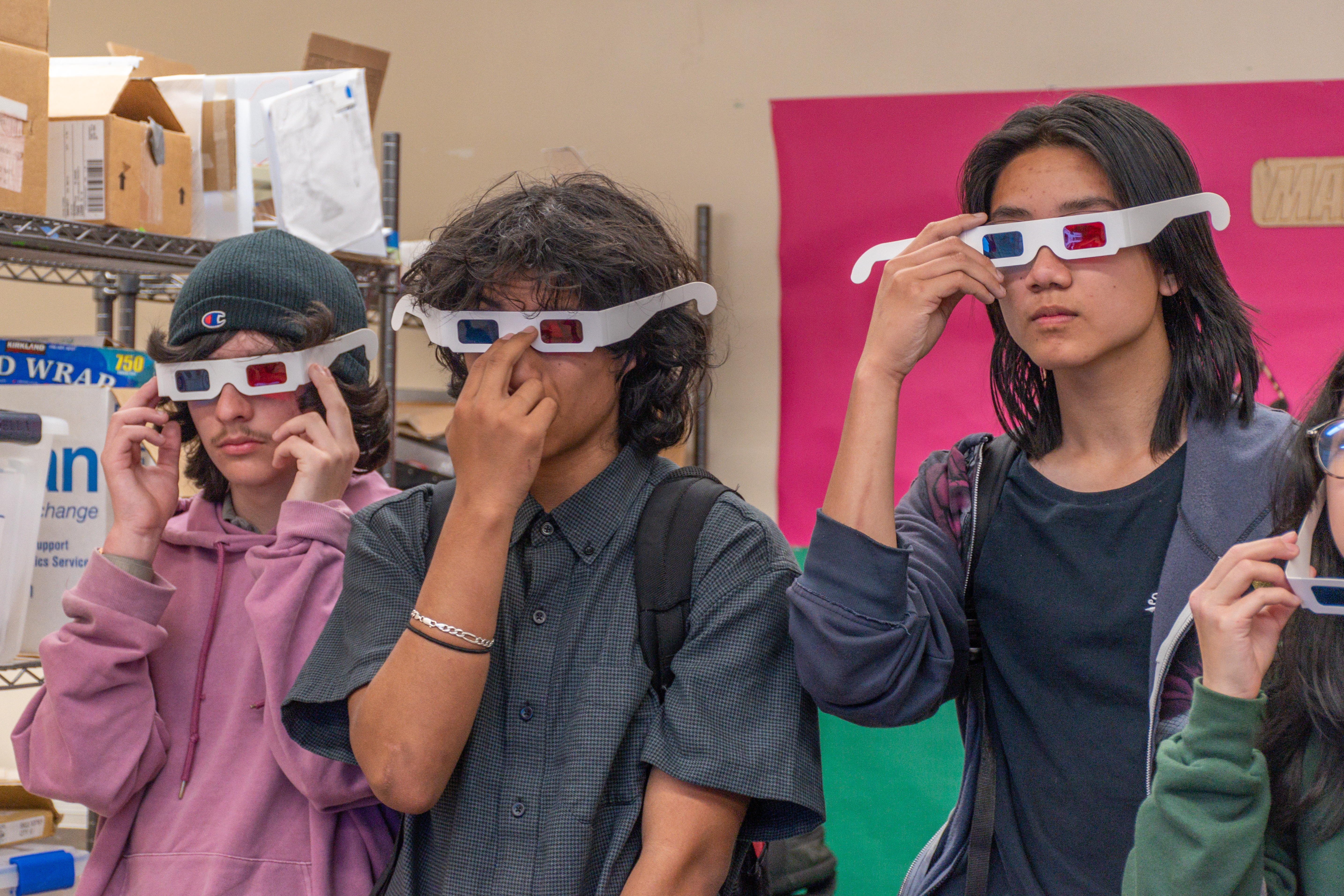 Group of students wearing red-blue 3D glasses
