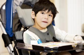 boy child sitting in a stroller