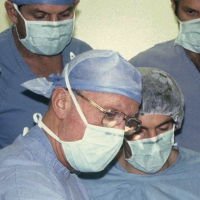 Dr. Alan Scott performing surgery with residents