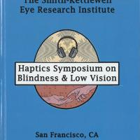 Cover of blue printed book entitled "Haptics Symposium on Blindness & Low Vision" from Smith-Kettlewell