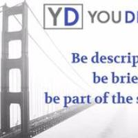 YouDescribe logo over a black and white image of the Golden Gate Bridge: it says "be descriptive, be brief, be part of the solution"
