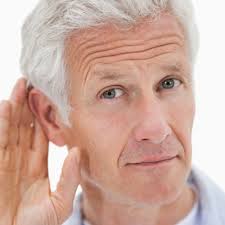 Man holding hand up to ear to listen