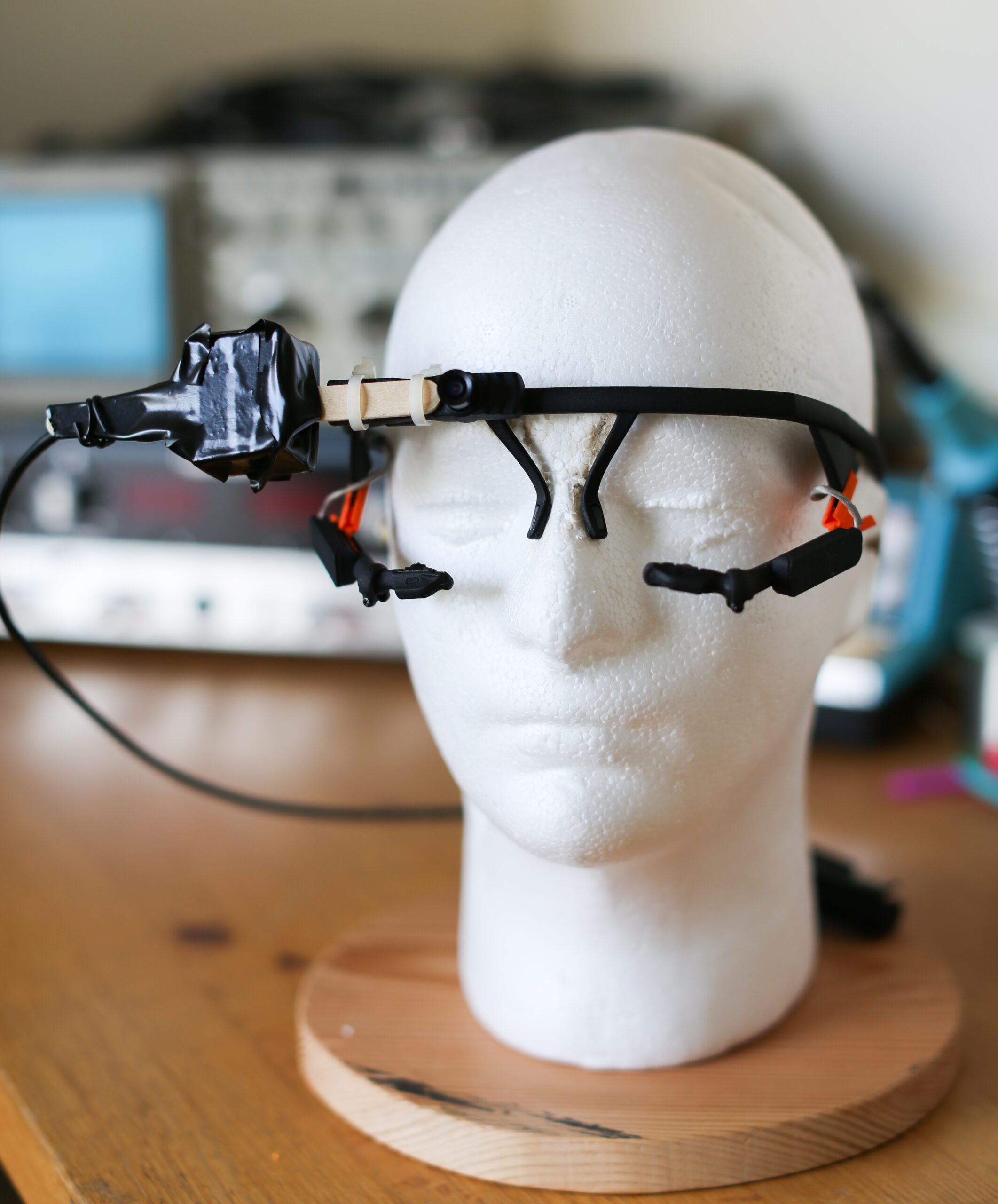 Experimental equipment: head-mounted eye-tracking goggles and head movement sensor
