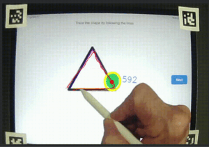 Shows four april tags on the corners of an iPad with an Apple Pencil being used to trace a triangle. The gaze is shown with green circle.
