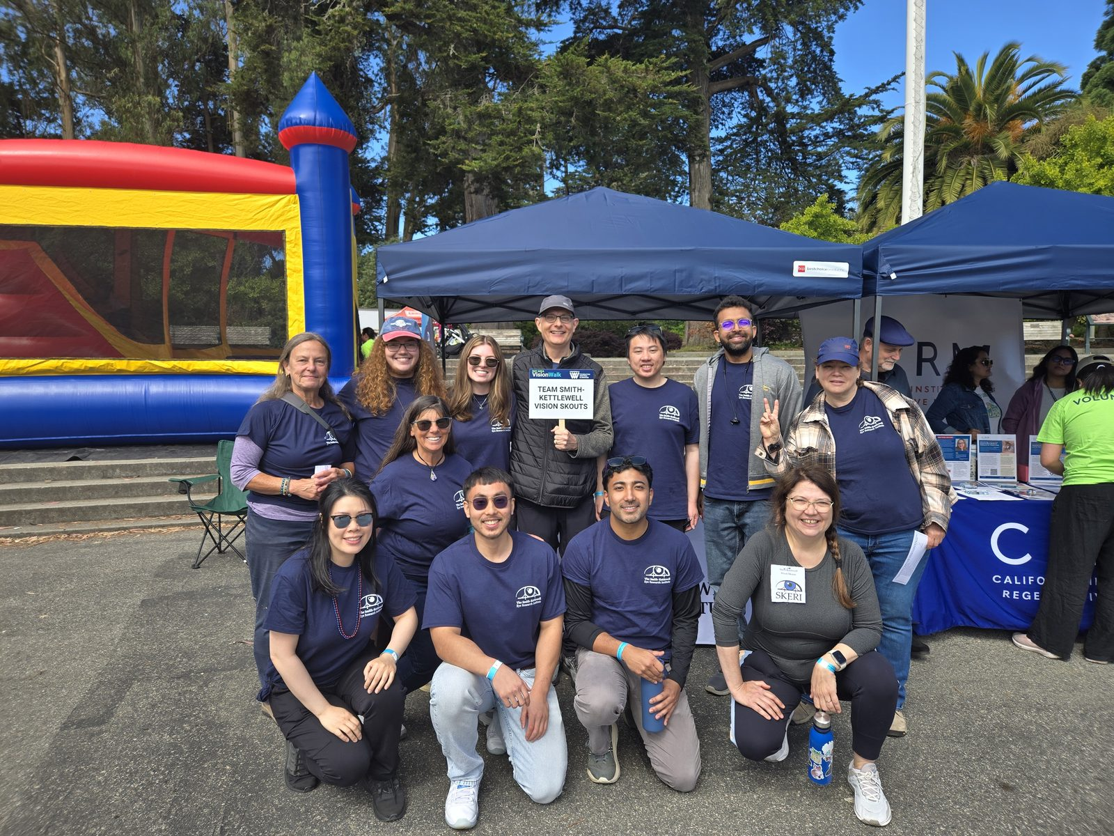 Team Smith-Kettlewell Vision SKouts poses together at the 2026 Bay Area VisionWalk in Golden Gate Park, San Francisco.