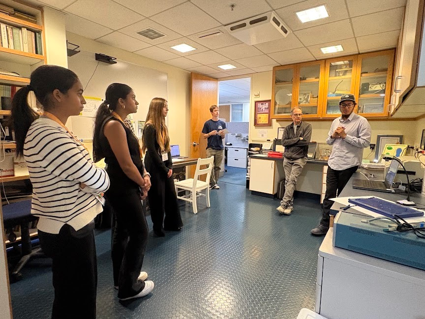 Summer Springboard students listen during a lab tour at Smith-Kettlewell.