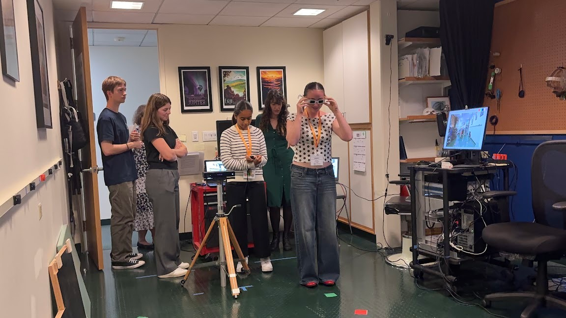 Summer Springboard students watch a demonstration of how low vision changes everyday sight.